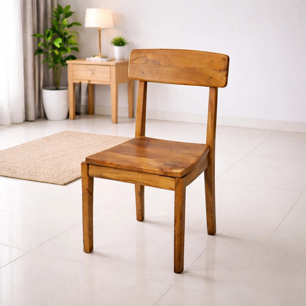 Wooden chair in a room with a desk and plants