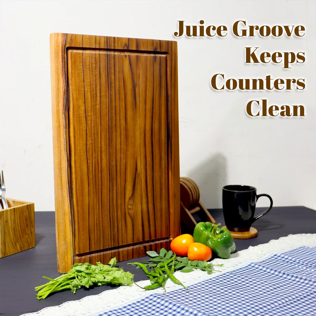 Wooden cutting board on a kitchen counter with vegetables and a cup, featuring text 'Juice Groove Keeps Counters Clean'.