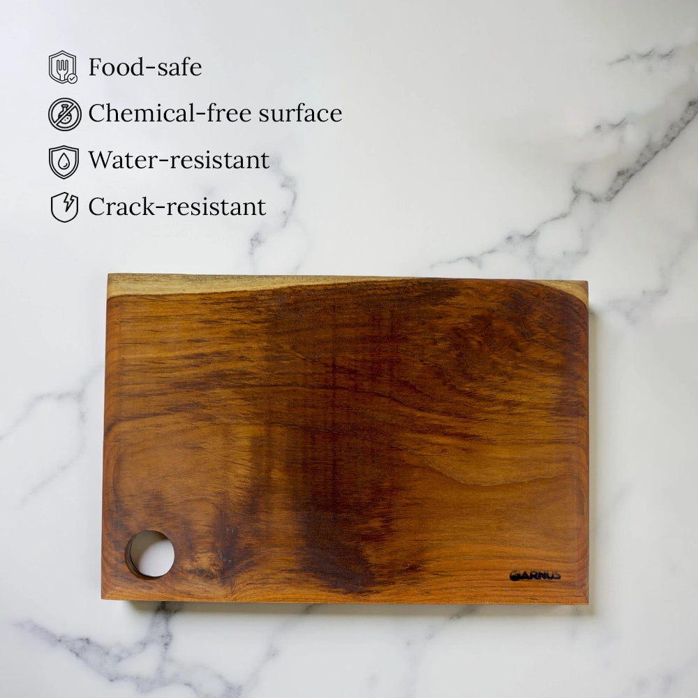 Wooden cutting board on a marble surface with features listed above it.