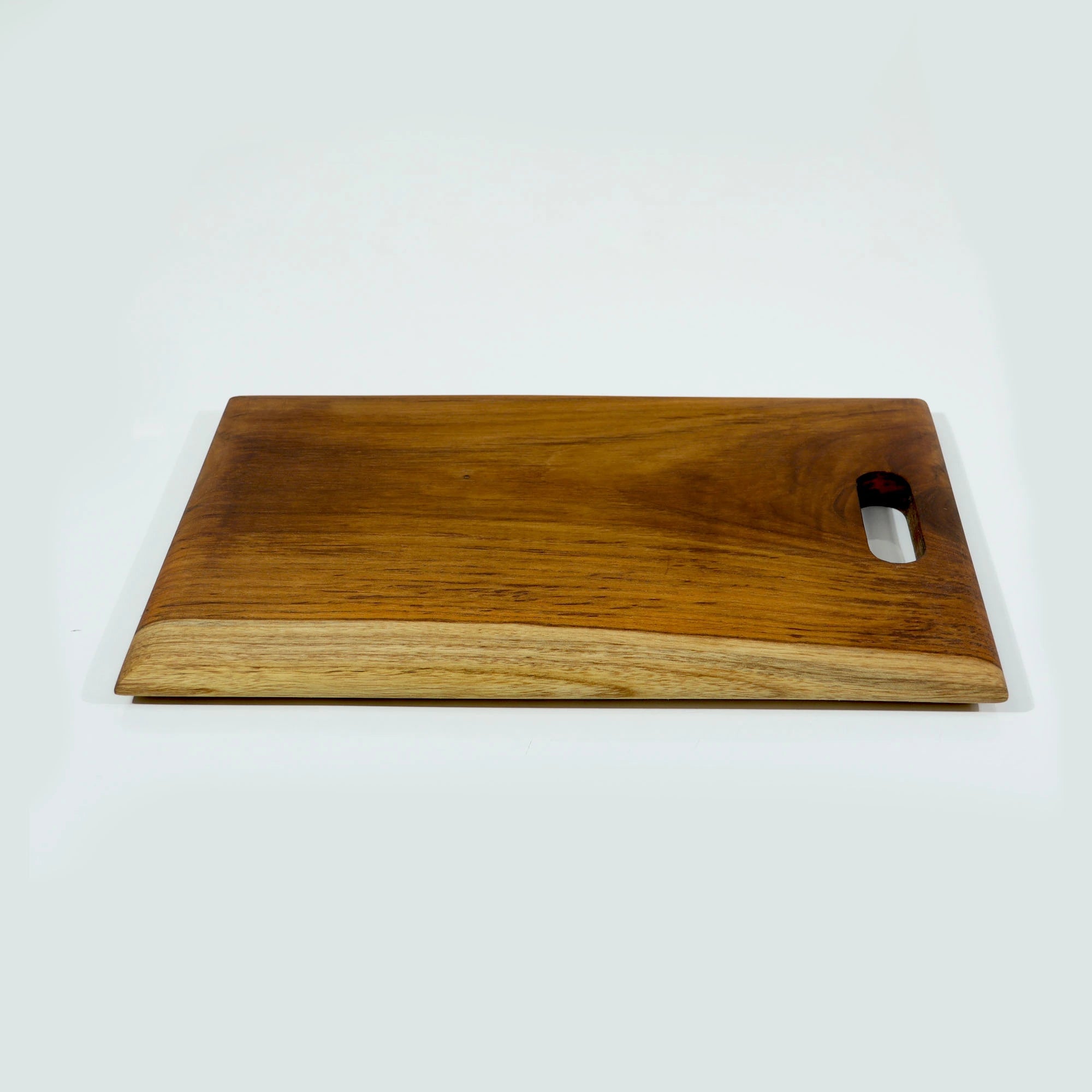 Organic Wooden chopping board on a white background