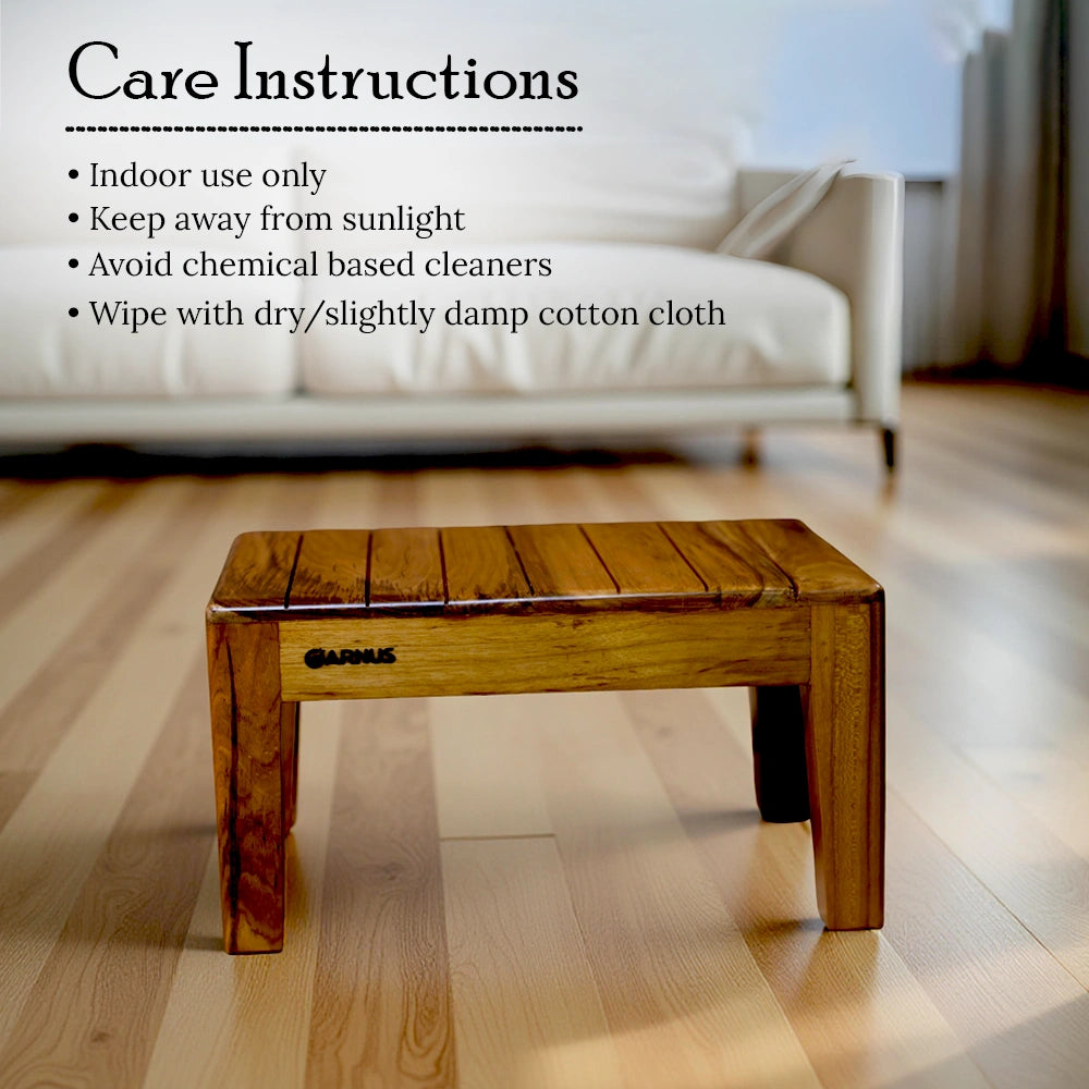 Wooden step stool on a wooden floor with care instructions text overlay