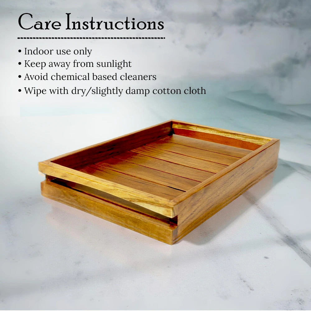 Wooden tray on a marble surface with care instructions text.