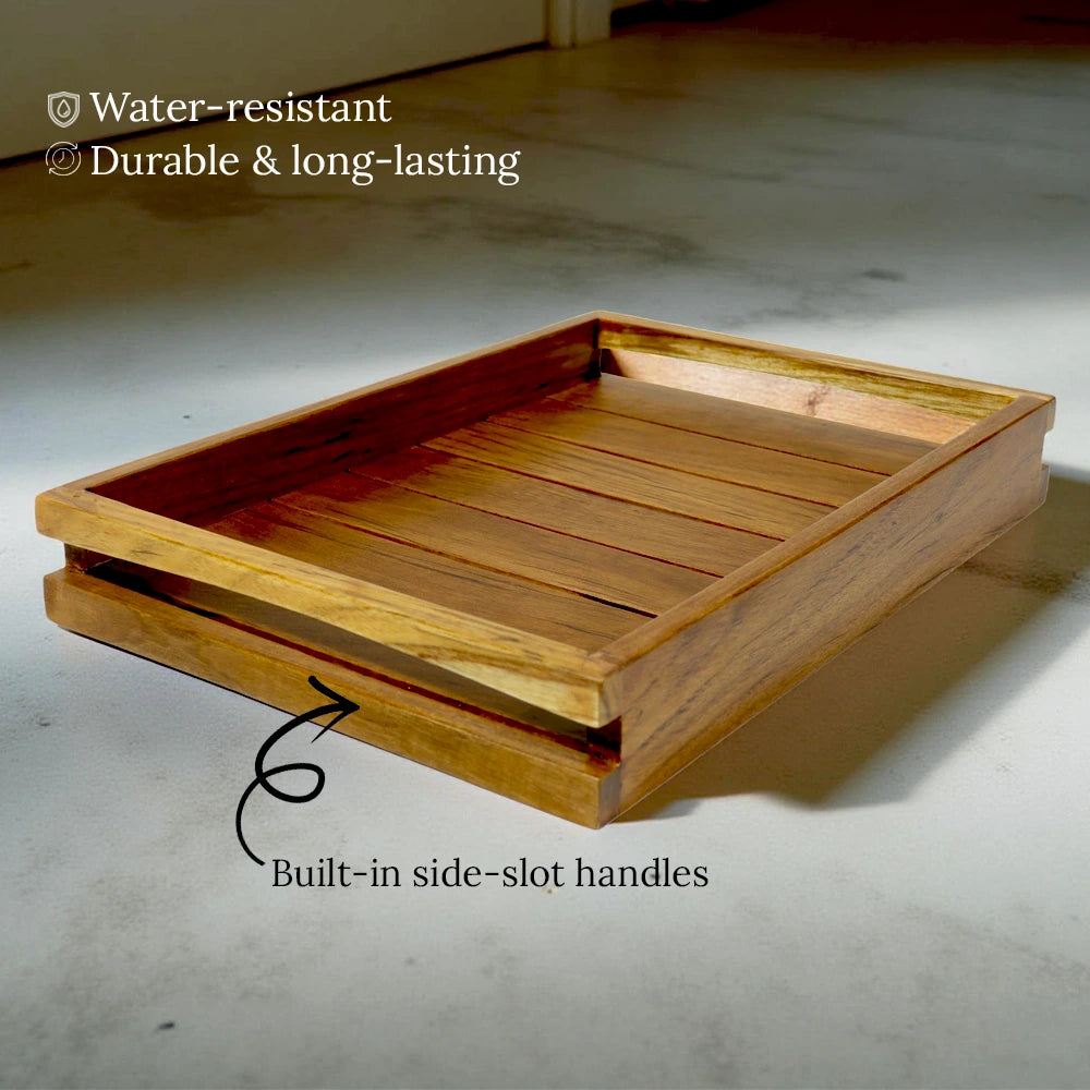 Wooden tray with built-in side-slot handles on a light gray floor.