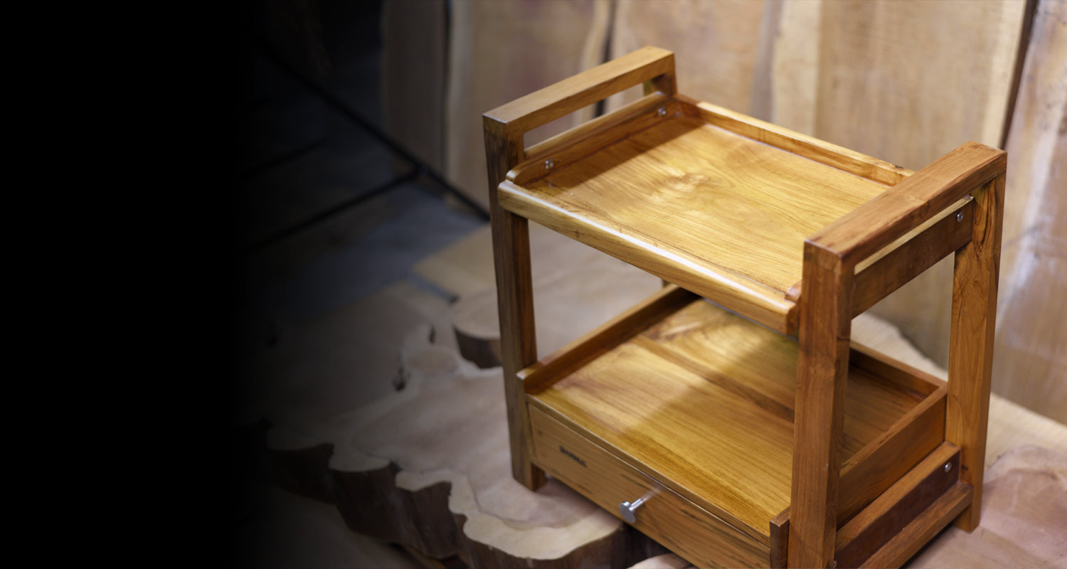 Wooden shelf with a drawer on a blurred background