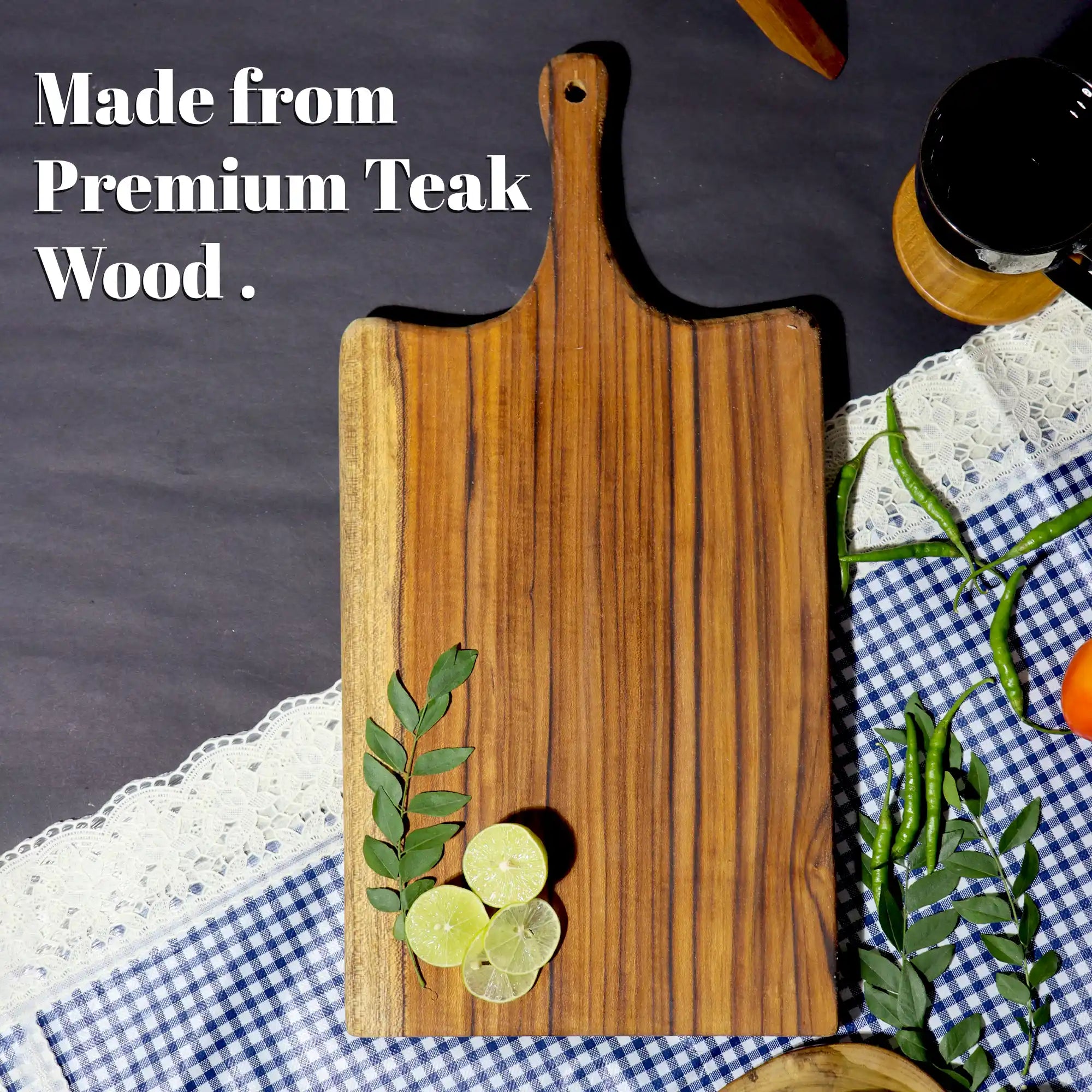 Wooden cutting board with decorative elements on a checkered tablecloth