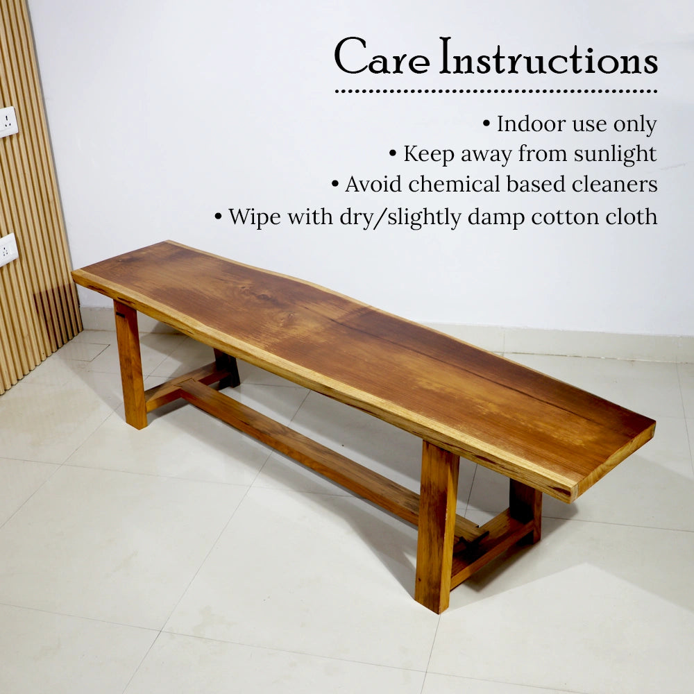 Tarana Solid Wood Long  Bench – 4 Seater on a tiled floor with care instructions text overlay