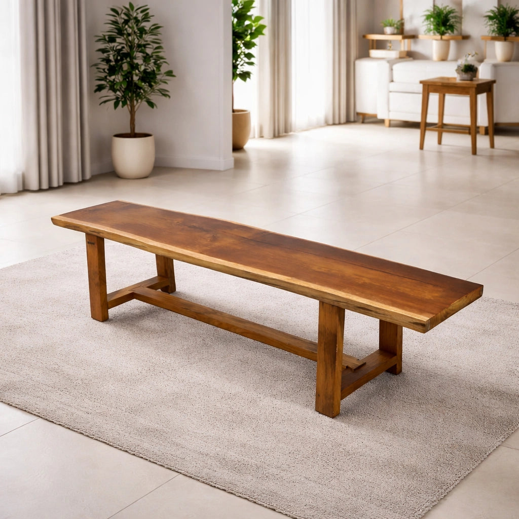 Tarana Solid Wood Long  Bench – 4 Seater in a bright room with light-colored flooring and plants.