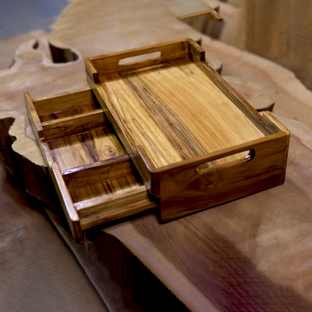 Wooden tray with a drawer on a wooden surface