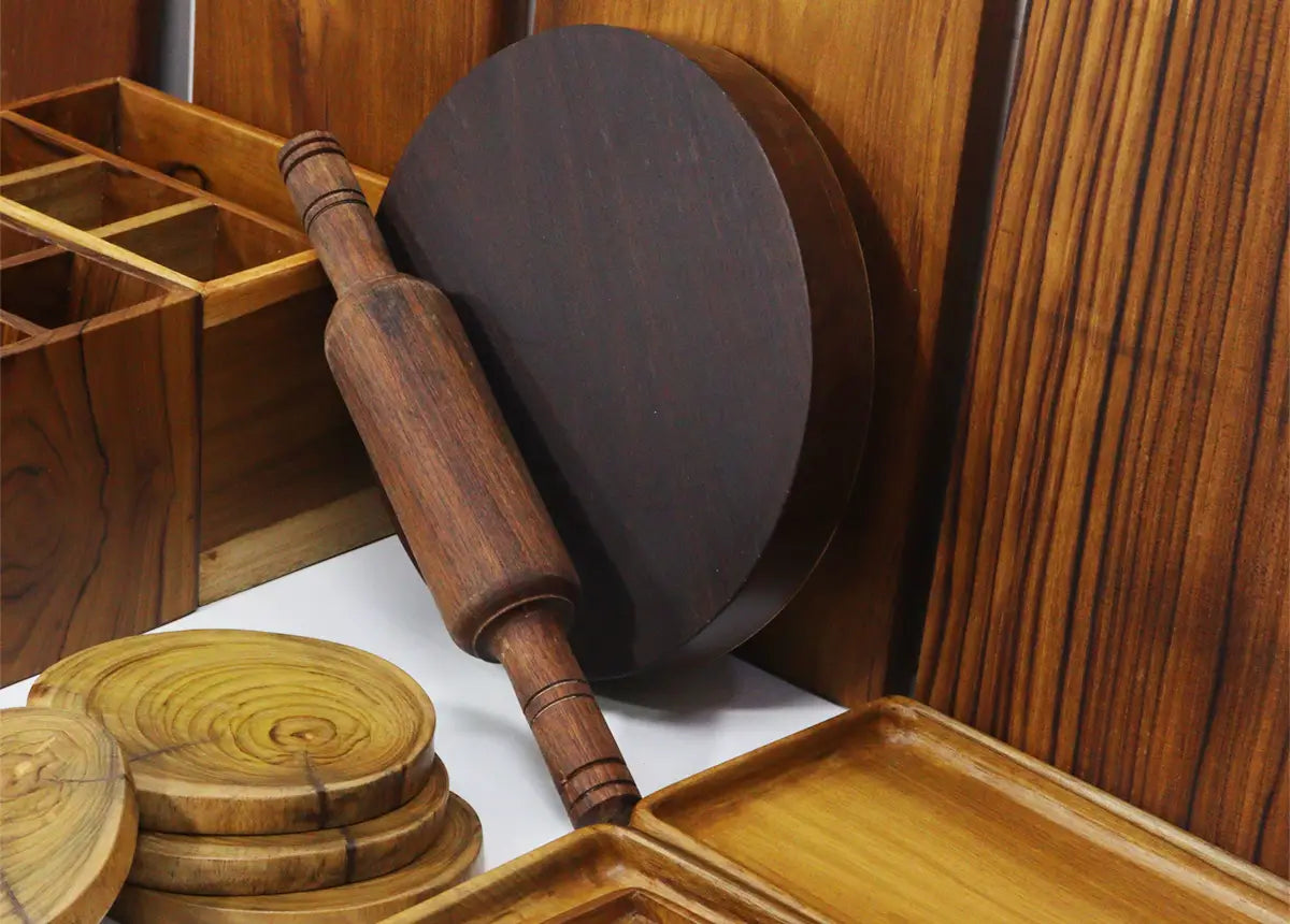 Wooden rolling pin and coasters on a wooden surface